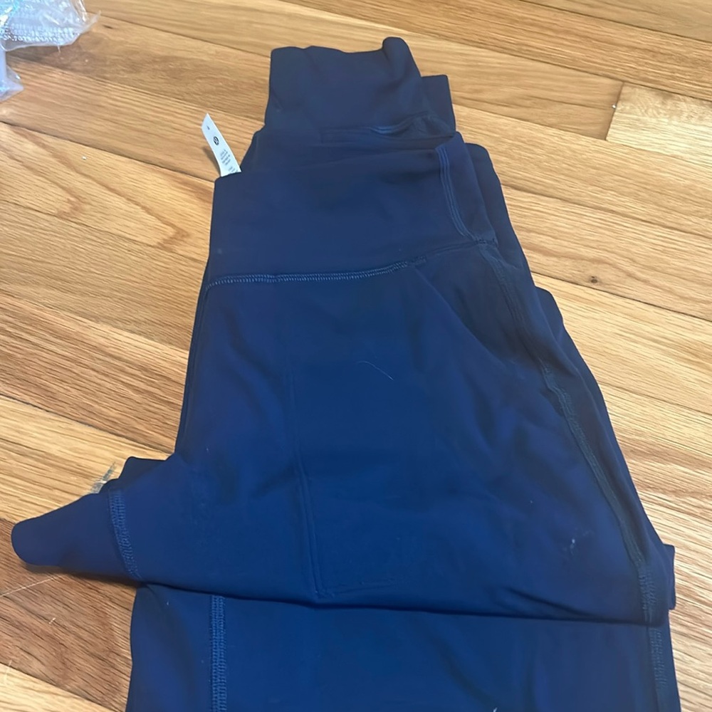 Lululemon pants with pockets - navy blue, never worn - size 4